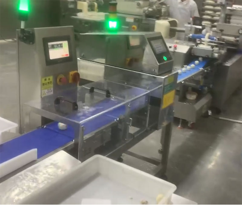 峰凌自动检重秤设备在食品生产行业应用
